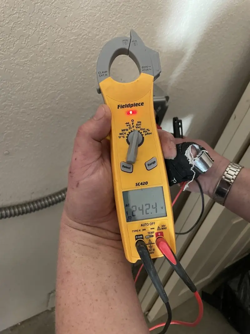 Voltage testing with clamp meter during Generator Installation in Winter Haven